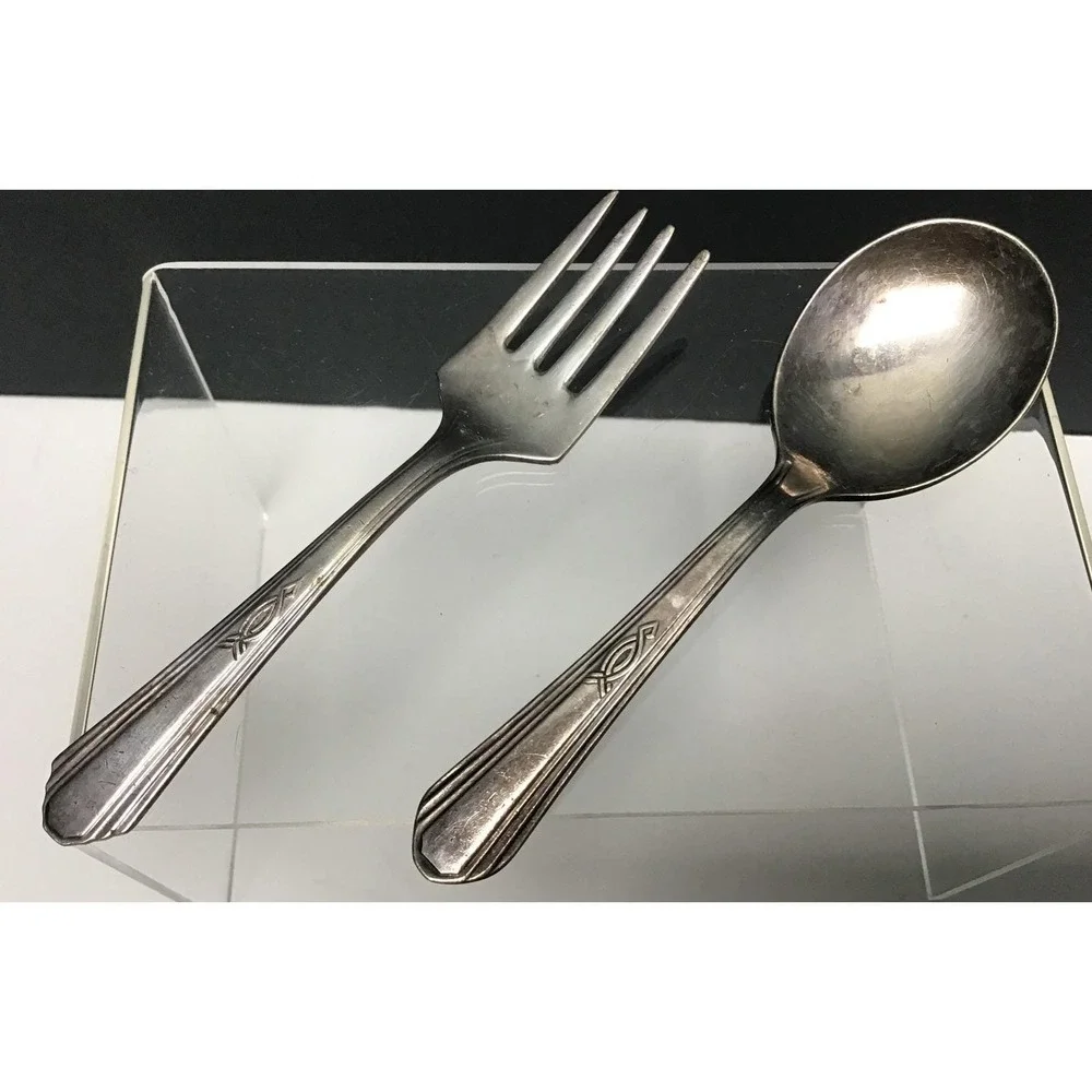Vintage W.M. Rogers silver plate baby fork and spoon set.